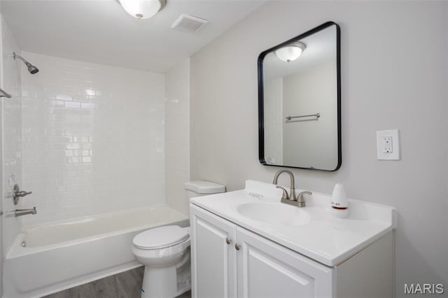 7648 Local Hillsboro Rd, Cedar Hill, MO 63016 - full bath with toilet, wood finished floors, bathing tub / shower combination, and vanity