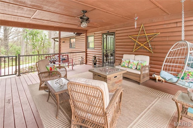 234 SE 350th St, Carrollton, IL 62016 - wooden deck with an outdoor living space with a fire pit and ceiling fan