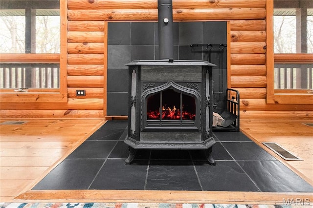 234 SE 350th St, Carrollton, IL 62016 - detailed view of log walls and a wood stove