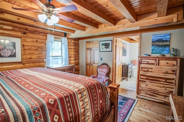 234 SE 350th St, Carrollton, IL 62016 - bedroom with wood ceiling, light wood-type flooring, beamed ceiling, and ensuite bath
