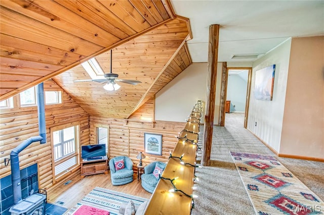 234 SE 350th St, Carrollton, IL 62016 - bonus room featuring log walls, baseboards, ceiling fan, high vaulted ceiling, and wood finished floors
