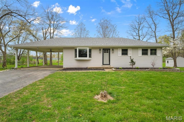 1399 Valli Ln, Saint Charles, MO 63304 - view of front of property featuring asphalt driveway, an attached carport, and a front yard