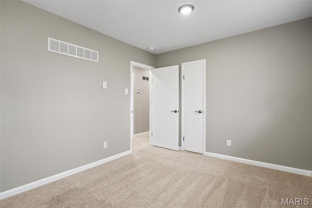 1399 Valli Ln, Saint Charles, MO 63304 - unfurnished bedroom featuring light carpet and baseboards