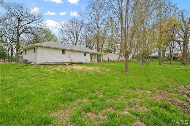 1399 Valli Ln, Saint Charles, MO 63304 - view of grassy yard featuring central AC