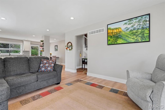 1 Picardy Dr, Lake St Louis, MO 63367 - living area with light wood finished floors, recessed lighting, and baseboards