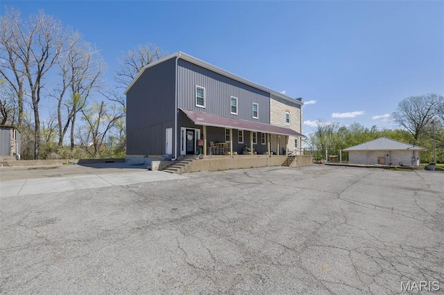 305 N Main St, Saint Genevieve, MO 63670 - view of front of property featuring covered porch