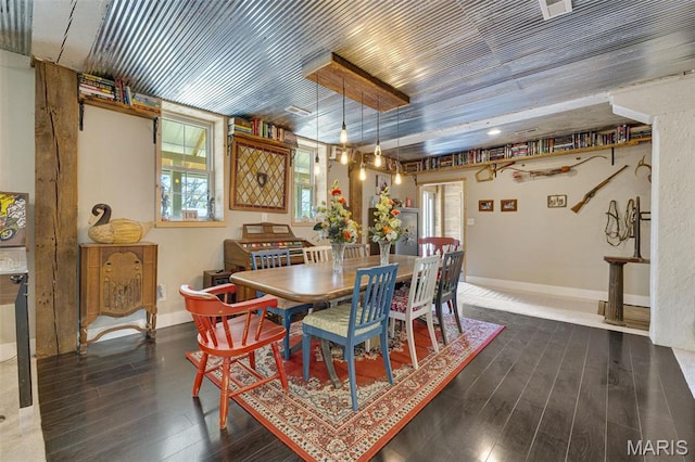 305 N Main St, Saint Genevieve, MO 63670 - dining area with healthy amount of natural light, wood finished floors, and baseboards