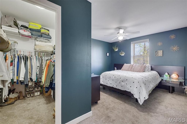 305 N Main St, Saint Genevieve, MO 63670 - bedroom with carpet floors, a closet, a ceiling fan, and baseboards