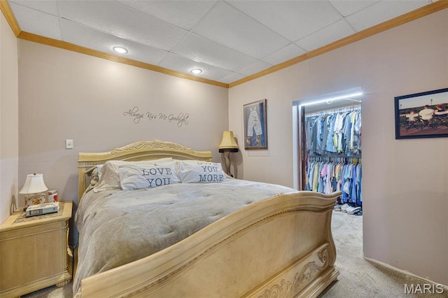 305 N Main St, Saint Genevieve, MO 63670 - bedroom with a spacious closet, ornamental molding, carpet, a closet, and a drop ceiling