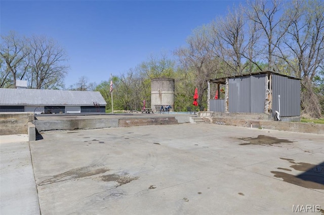 305 N Main St, Saint Genevieve, MO 63670 - view of patio with an outbuilding