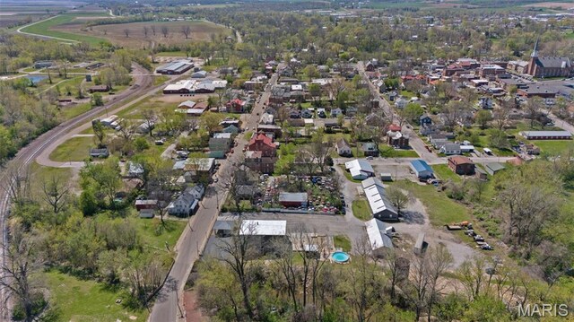 305 N Main St, Saint Genevieve, MO 63670 - aerial view of property and surrounding area with nearby suburban area