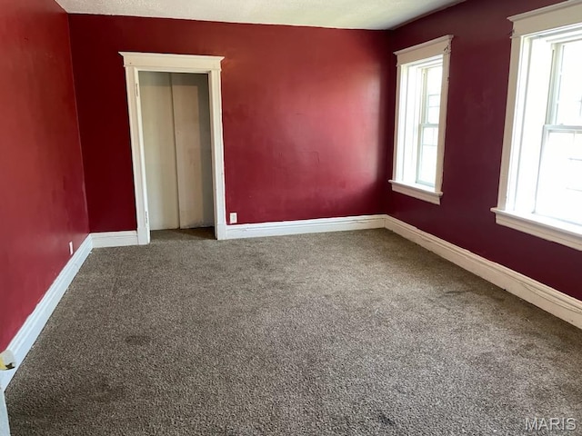 4972 Thekla Ave, Saint Louis, MO 63115 - carpeted spare room featuring baseboards