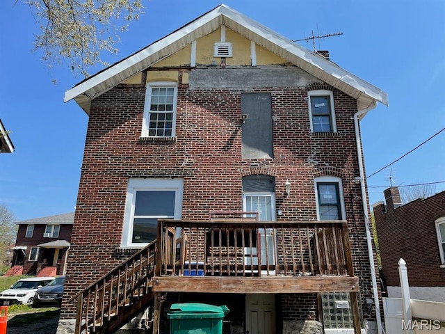 4972 Thekla Ave, Saint Louis, MO 63115 - view of front of home with brick siding and a deck