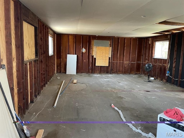 4972 Thekla Ave, Saint Louis, MO 63115 - spare room featuring wood walls