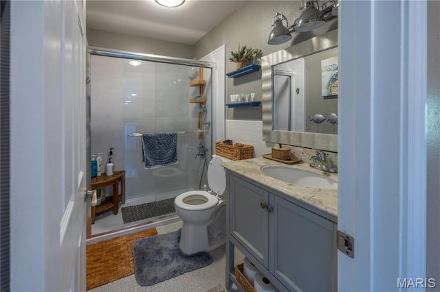 1757 Rue Marseilles, Bonne Terre, MO 63628 - bathroom featuring a shower stall, vanity, toilet, and tile patterned floors