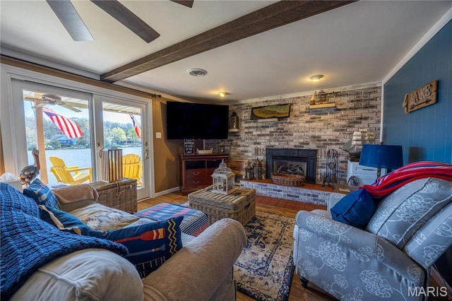 1757 Rue Marseilles, Bonne Terre, MO 63628 - living room with ceiling fan, wood finished floors, beam ceiling, a fireplace, and baseboards
