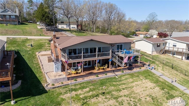 1757 Rue Marseilles, Bonne Terre, MO 63628 - rear view of house featuring stairway, a deck, a sunroom, and a residential view