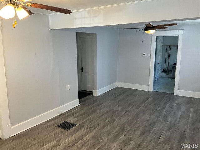 2538 Jerden Ave, Granite City, IL 62040 - spare room featuring a ceiling fan, dark wood-style floors, and baseboards