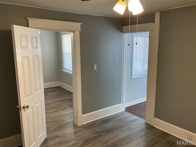 2538 Jerden Ave, Granite City, IL 62040 - unfurnished room with a ceiling fan, dark wood-style flooring, and baseboards