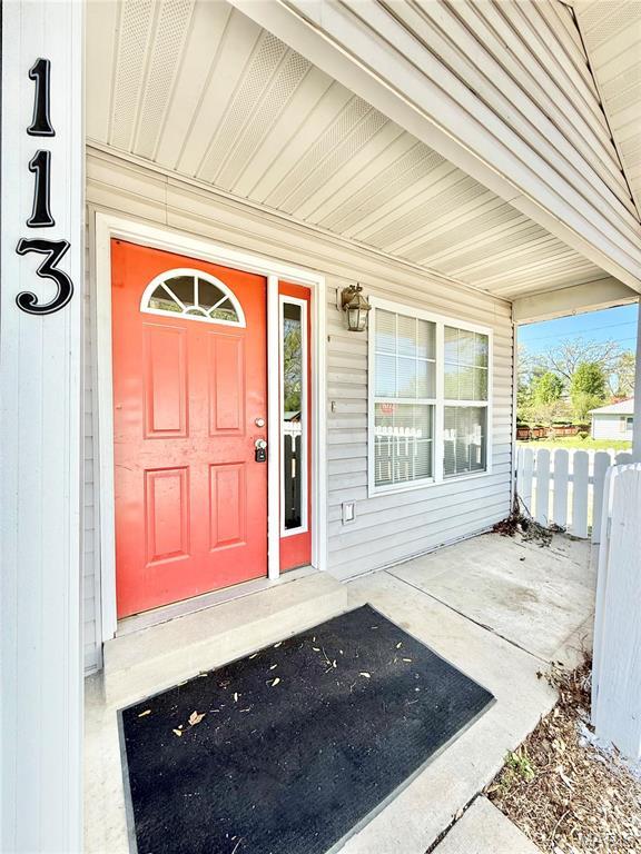 113 N Long St, Bonne Terre, MO 63628 - property entrance with fence and a porch