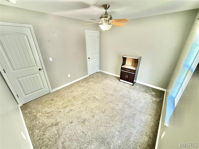 113 N Long St, Bonne Terre, MO 63628 - unfurnished bedroom featuring carpet flooring, baseboards, and a ceiling fan