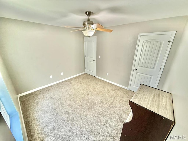 113 N Long St, Bonne Terre, MO 63628 - unfurnished bedroom with carpet, baseboards, and a ceiling fan
