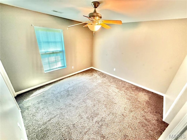 113 N Long St, Bonne Terre, MO 63628 - spare room with a ceiling fan, carpet floors, and baseboards