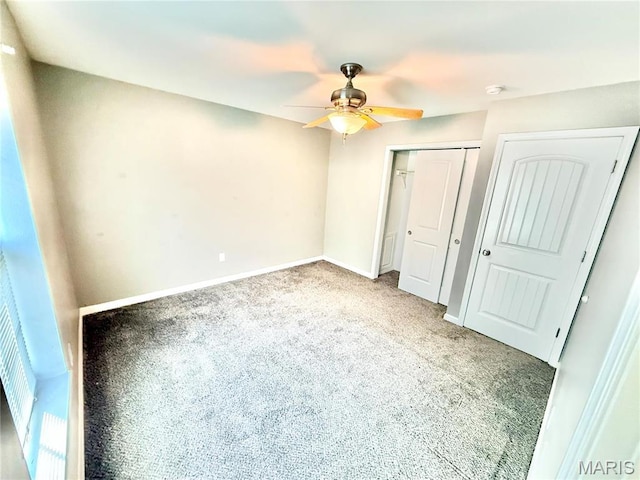 113 N Long St, Bonne Terre, MO 63628 - unfurnished bedroom featuring carpet floors, baseboards, a closet, and a ceiling fan
