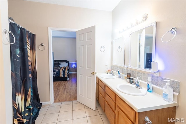 16910 Lawrence Dr, Saint Robert, MO 65584 - bathroom with double vanity and tile patterned flooring