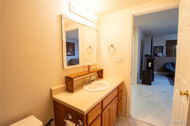 16910 Lawrence Dr, Saint Robert, MO 65584 - bathroom with marble finish flooring and vanity