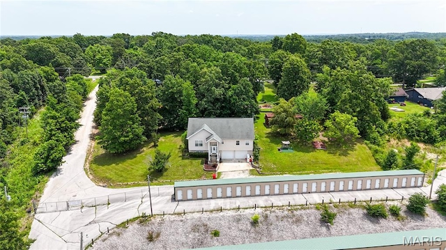 16910 Lawrence Dr, Saint Robert, MO 65584 - drone / aerial view of a heavily wooded area