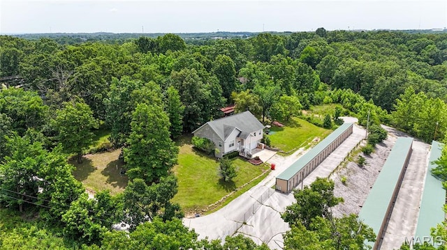 16910 Lawrence Dr, Saint Robert, MO 65584 - aerial view of property and surrounding area with a forest