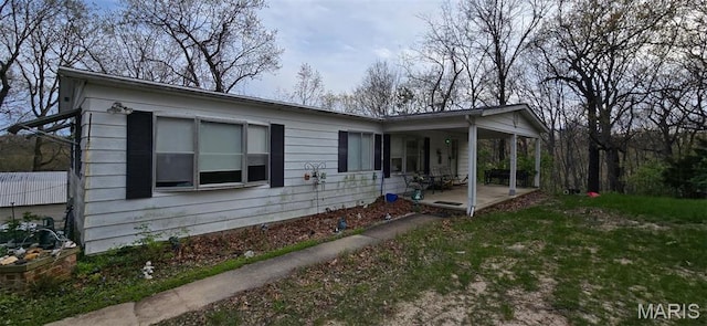 4598 Schenk Rd, Barnhart, MO 63012 - view of front of house featuring a porch