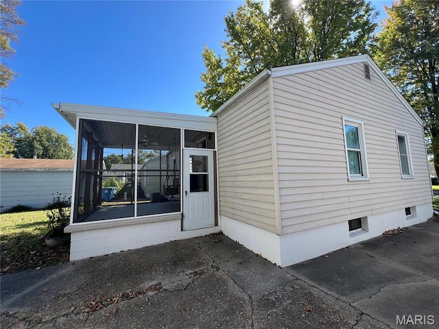 1717 Spring Ave, Granite City, IL 62040 - view of front of home with a sunroom and ceiling fan