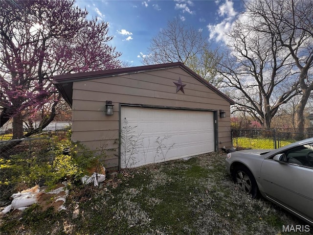 detached garage with fence