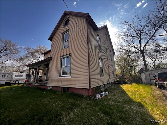 view of home's exterior featuring a lawn