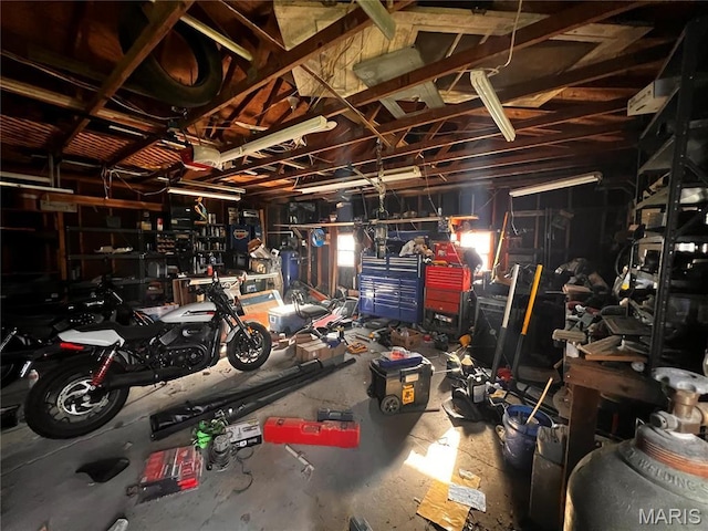 garage with a workshop area