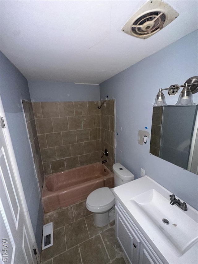 2370 Hawthorne Manor Dr, Florissant, MO 63031 - bathroom with toilet, tub / shower combination, vanity, and tile patterned flooring