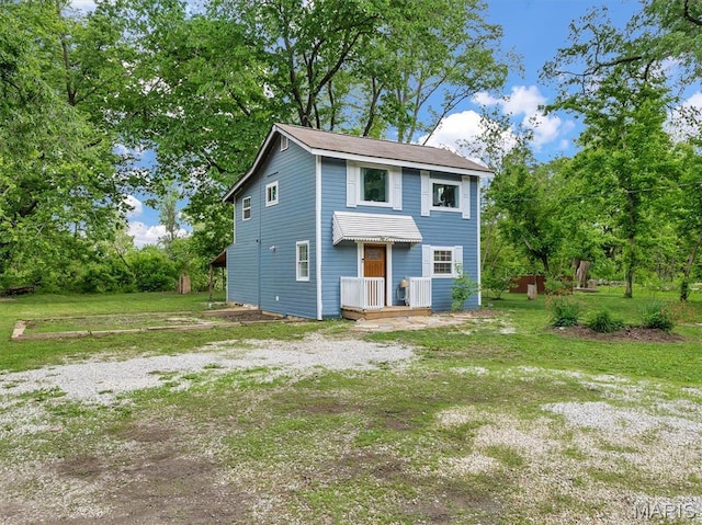 2822 State Rd W, Eureka, MO 63025 - back of house featuring a yard