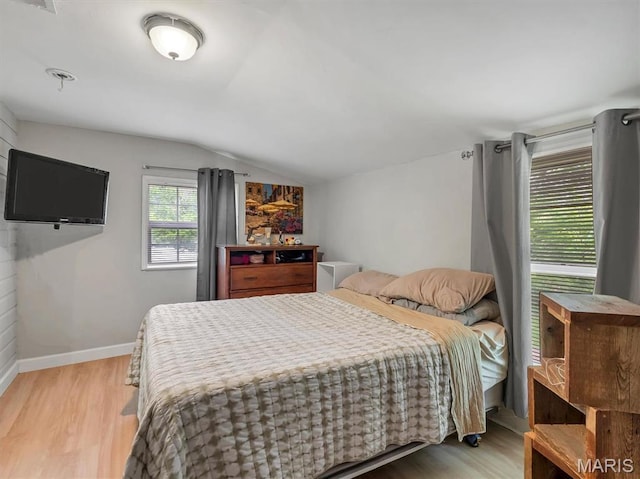 2822 State Rd W, Eureka, MO 63025 - bedroom with lofted ceiling, light wood-style floors, and baseboards