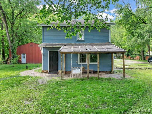 2822 State Rd W, Eureka, MO 63025 - rear view of house featuring a yard and a porch