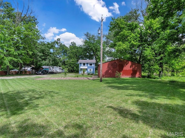 2822 State Rd W, Eureka, MO 63025 - view of grassy yard with an outbuilding