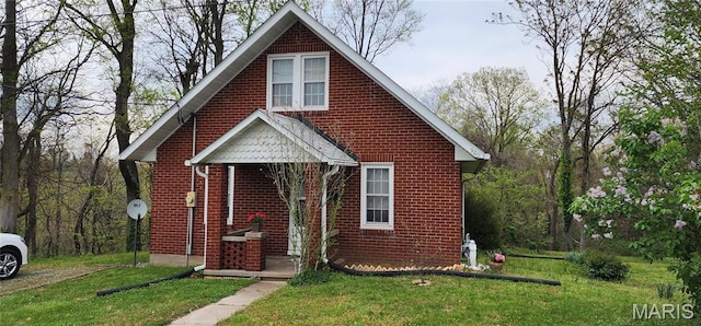 500 Church St, Chester, IL 62233 - bungalow-style home with brick siding and a front lawn