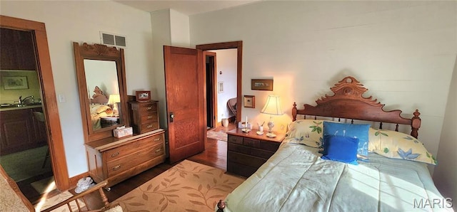 500 Church St, Chester, IL 62233 - bedroom featuring wood finished floors