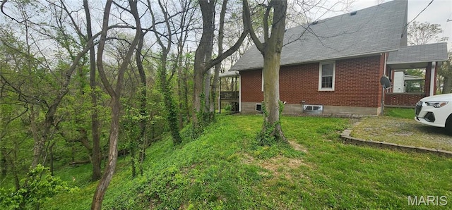 500 Church St, Chester, IL 62233 - view of home's exterior featuring brick siding, a shingled roof, and a lawn