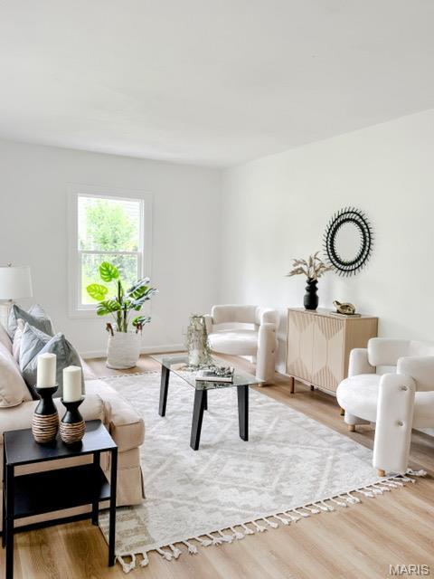 4230 Marlin Dr, Saint Louis, MO 63121 - living area featuring wood finished floors