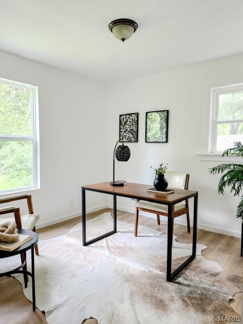 4230 Marlin Dr, Saint Louis, MO 63121 - office area featuring light wood finished floors and baseboards