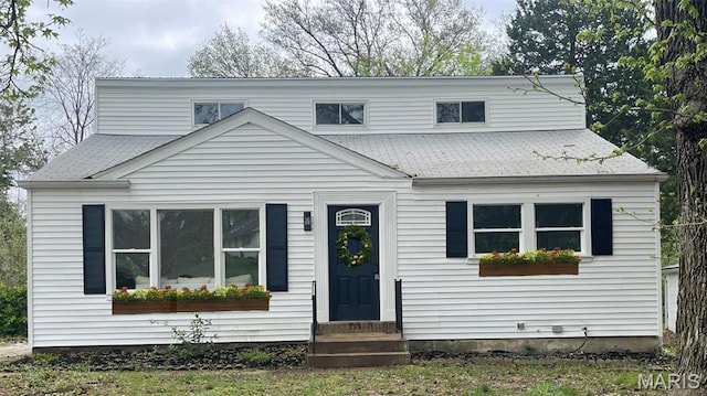 4230 Marlin Dr, Saint Louis, MO 63121 - view of front facade with a shingled roof