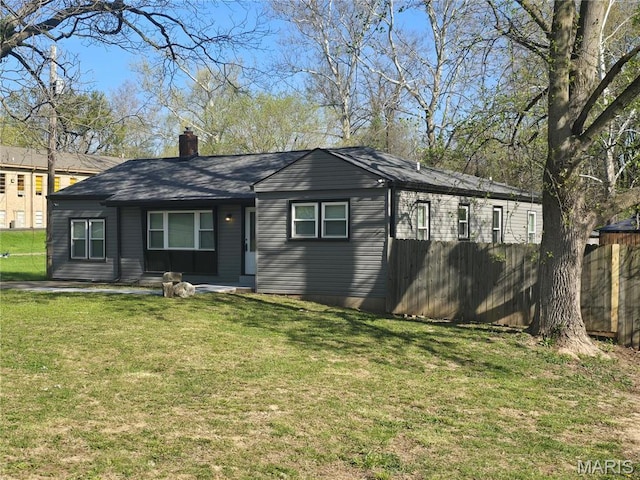 view of front of property featuring a chimney