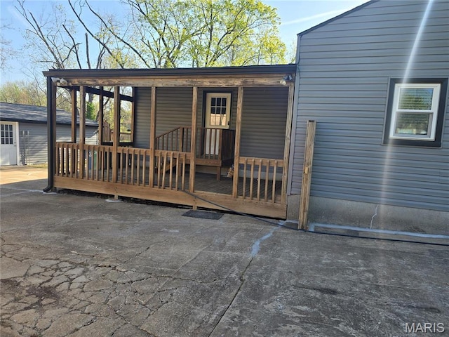 deck featuring covered porch